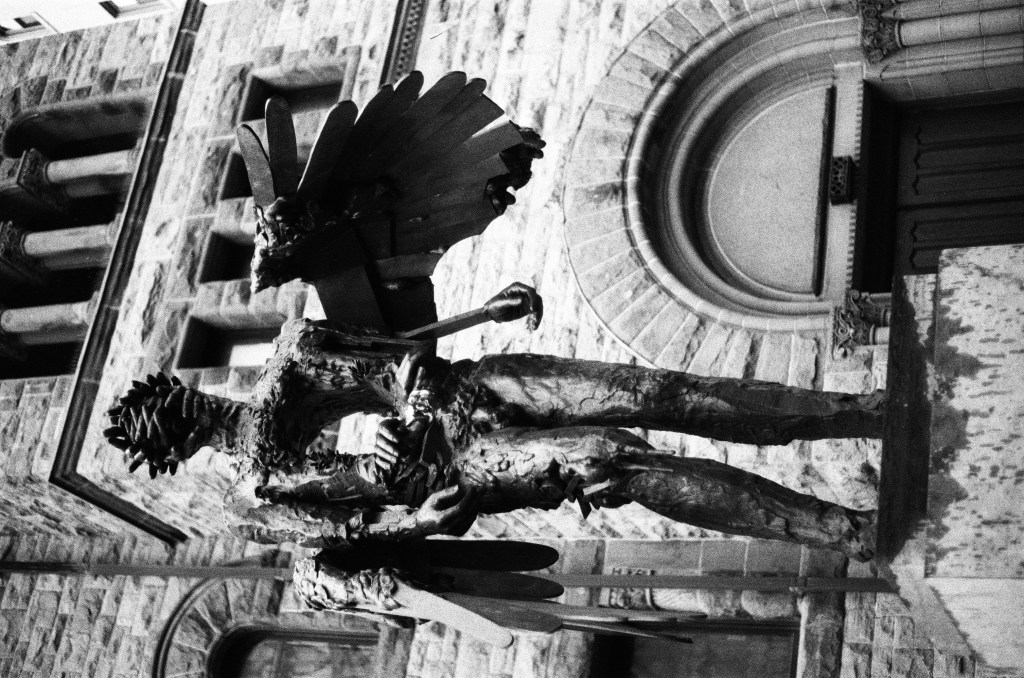 Standing too close to a&nbsp;statue